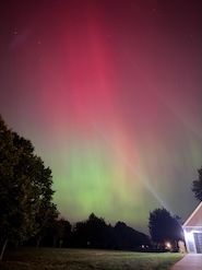 Northern lights over a neighborhood